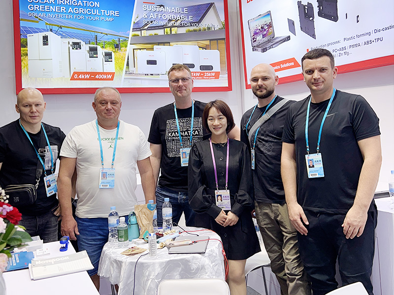 DELIXI executives shaking hands with German precision engineering clients after contract signing