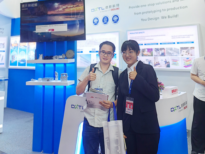 DELIXI team celebrating successful partnership with Japanese automotive manufacturer at Tokyo facility